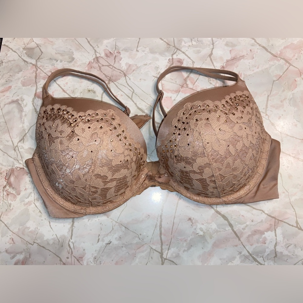 Nude rhinestone Victorias Secret bra with lace detail. Size 36C.
